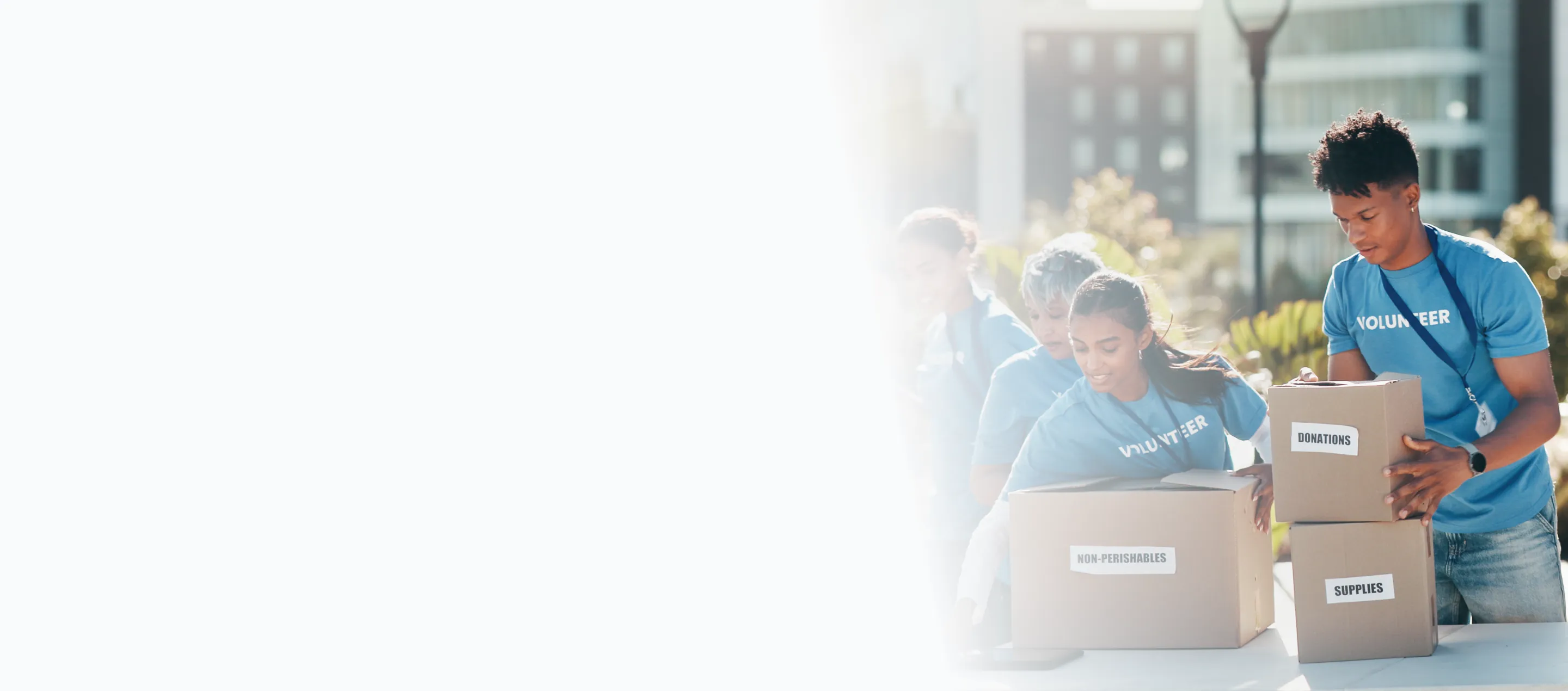 Non-profit volunteers organizing donation boxes