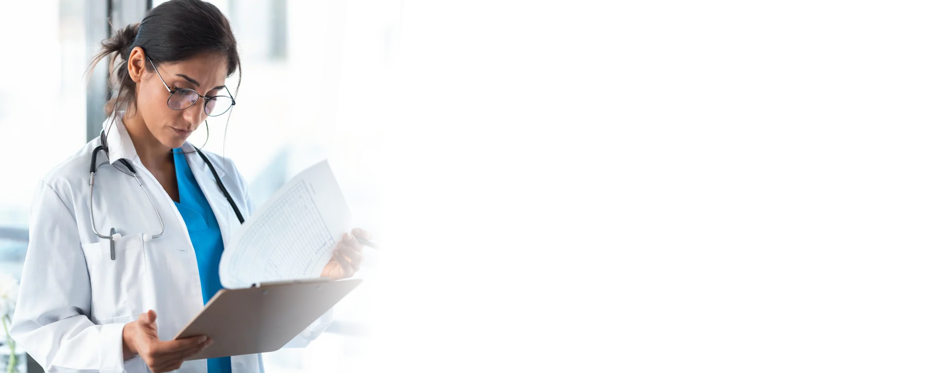 Doctor reviewing compliance documents