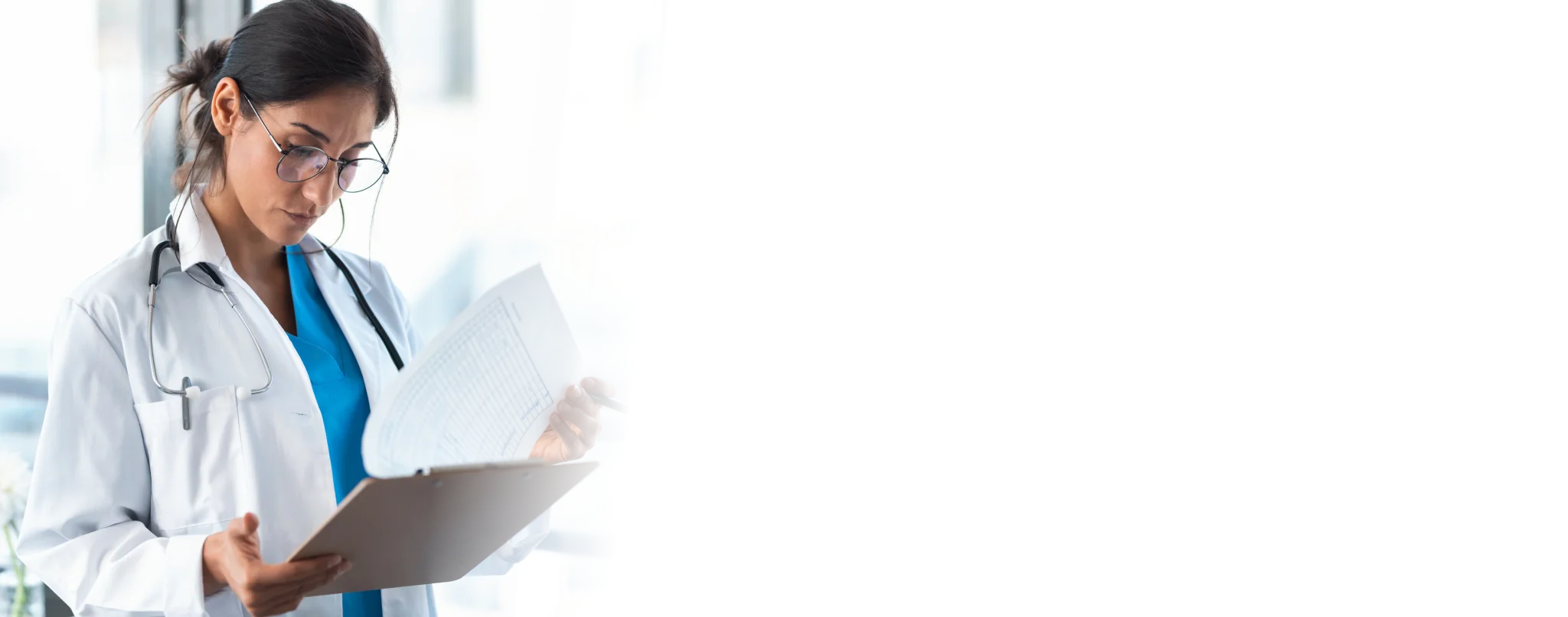 Doctor reviewing compliance documents